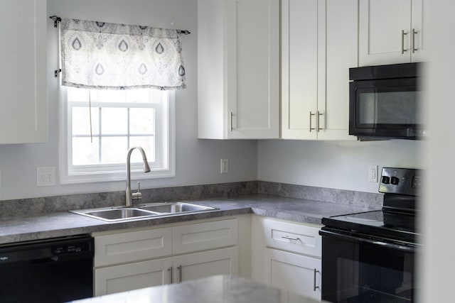 59,61,61A,63,63 Woodlee Road, Staunton, VA 24401 - kitchen featuring black appliances and white cabinets