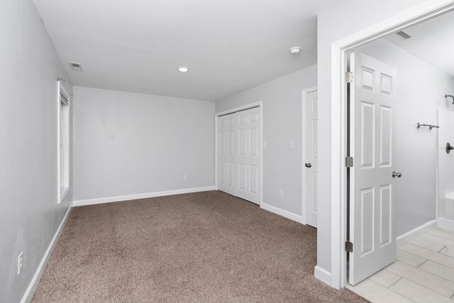 59,61,61A,63,63 Woodlee Road, Staunton, VA 24401 - unfurnished bedroom featuring light carpet, a closet, and recessed lighting