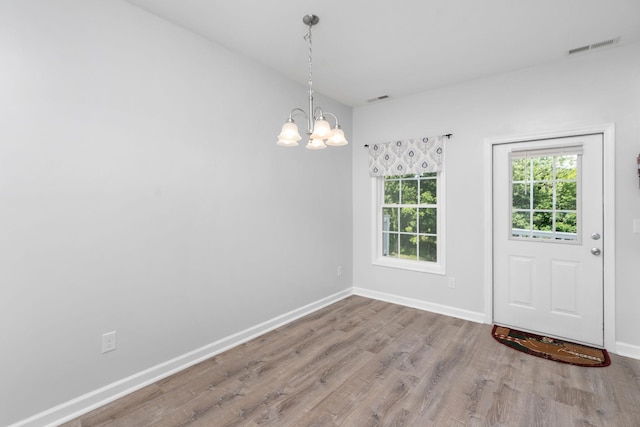 59,61,61A,63,63 Woodlee Road, Staunton, VA 24401 - unfurnished dining area featuring a chandelier and wood finished floors