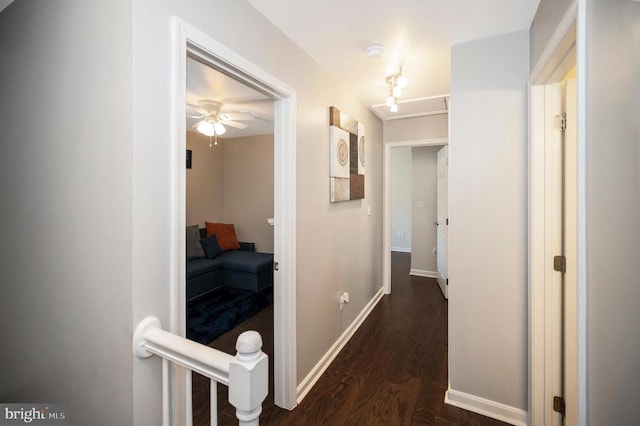 11714 Falcon Ridge Dr, Fredericksburg, VA 22407 - hallway with dark wood-type flooring and baseboards