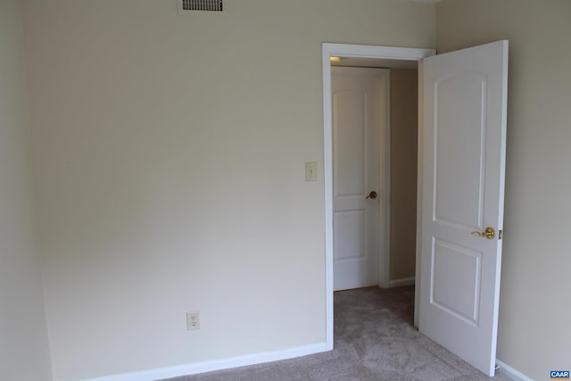 1508 Villa Ter Unit F, Charlottesville, VA 22903 - empty room with light colored carpet, baseboards, and visible vents