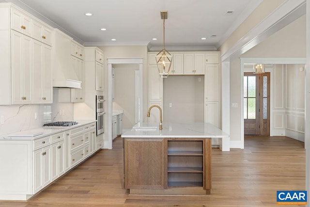 100 Stable Ln, Lynchburg, VA 24503 - kitchen featuring open shelves, stainless steel appliances, light wood finished floors, a kitchen island with sink, and ornamental molding