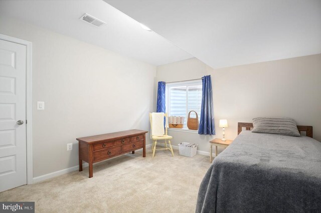 bedroom with carpet flooring and baseboards