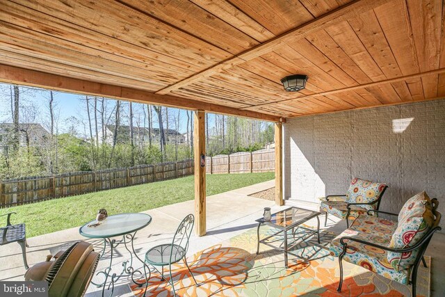 sunroom / solarium featuring plenty of natural light