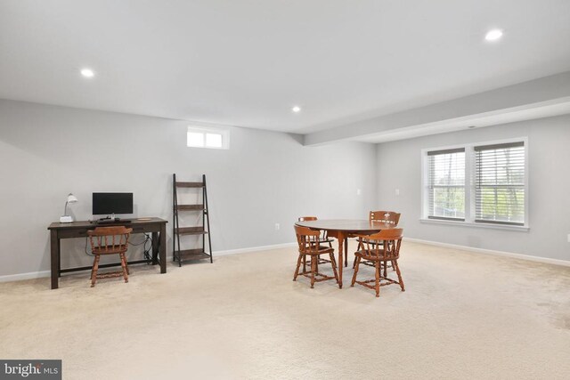 dining room with recessed lighting, light carpet, plenty of natural light, and an office area