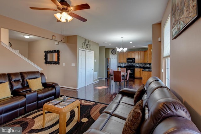 2018 Silver Bell Ct, Culpeper, VA 22701 - living area featuring a chandelier, dark wood-style flooring, a ceiling fan, and recessed lighting