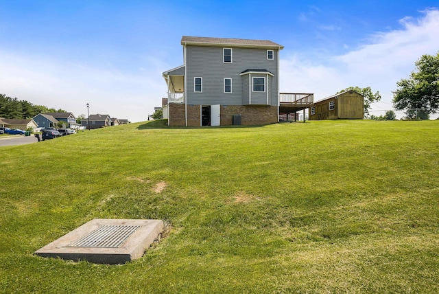 324 Rustic Ave, Broadway, VA 22815 - rear view of house featuring a yard, central air condition unit, and brick siding