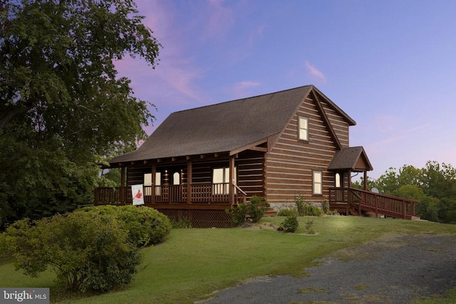 6403 Zachary Taylor Hwy, Culpeper, VA 22701 - view of home's exterior featuring roof with shingles, a yard, and a deck