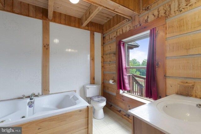 6403 Zachary Taylor Hwy, Culpeper, VA 22701 - bathroom with tile patterned floors, toilet, wood walls, a whirlpool tub, and vanity