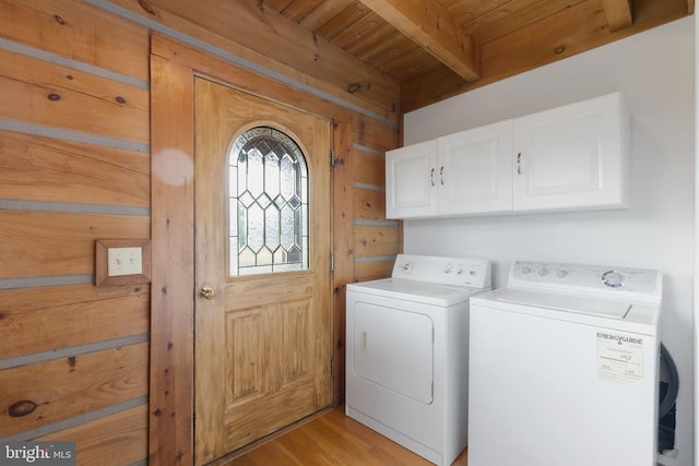 6403 Zachary Taylor Hwy, Culpeper, VA 22701 - clothes washing area with wooden ceiling, washing machine and dryer, cabinet space, and light wood finished floors
