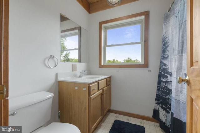 6403 Zachary Taylor Hwy, Culpeper, VA 22701 - full bathroom with toilet, vanity, and baseboards