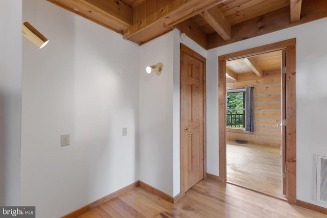 6403 Zachary Taylor Hwy, Culpeper, VA 22701 - hall featuring light wood-type flooring, beam ceiling, wood ceiling, and baseboards