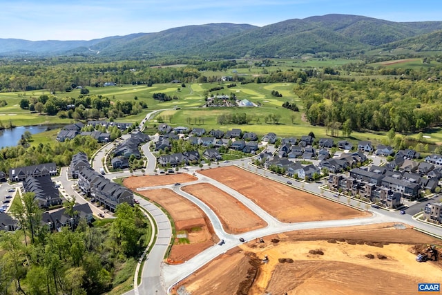 bird's eye view featuring a water and mountain view and a residential view