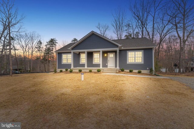 6000 Bills Rd, Mineral, VA 23117 - view of front of property featuring covered porch and roof with shingles