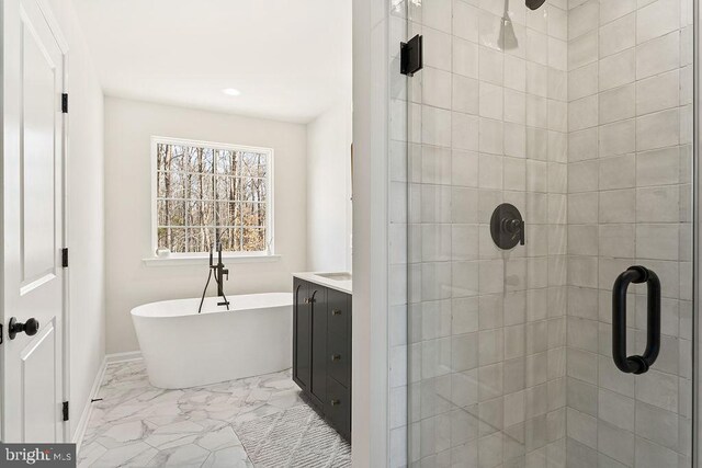 6000 Bills Rd, Mineral, VA 23117 - bathroom with a shower stall, marble finish floors, a freestanding bath, baseboards, and recessed lighting