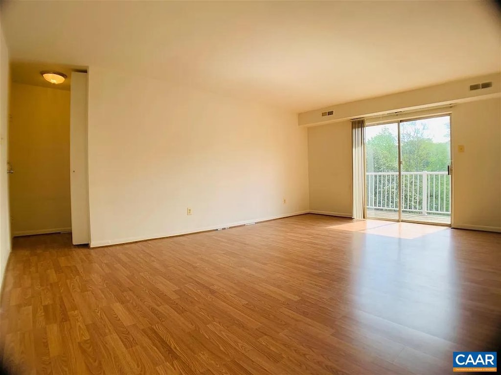 640 Runnel Ct Unit 10, Charlottesville, VA 22901 - unfurnished room featuring wood finished floors and baseboards