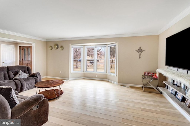 9150 James Madison Hwy, Warrenton, VA 20186 - living room featuring ornamental molding and light wood-style floors