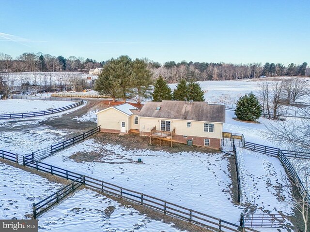 snowy aerial view with a rural view