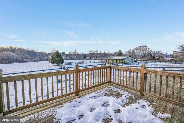 view of snow covered deck