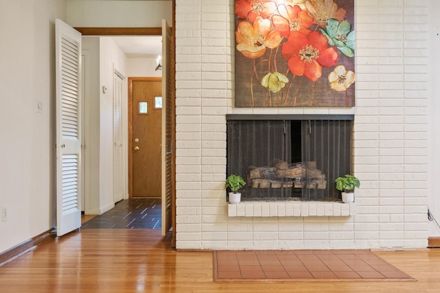 616 Lynn Ln, Waynesboro, VA 22980 - unfurnished living room with wood finished floors and a fireplace
