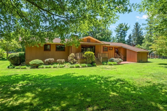 616 Lynn Ln, Waynesboro, VA 22980 - back of house with a lawn