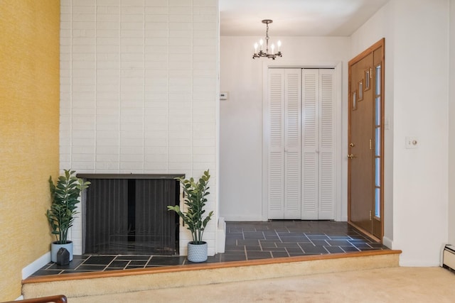 616 Lynn Ln, Waynesboro, VA 22980 - entrance foyer featuring a chandelier and a tiled fireplace