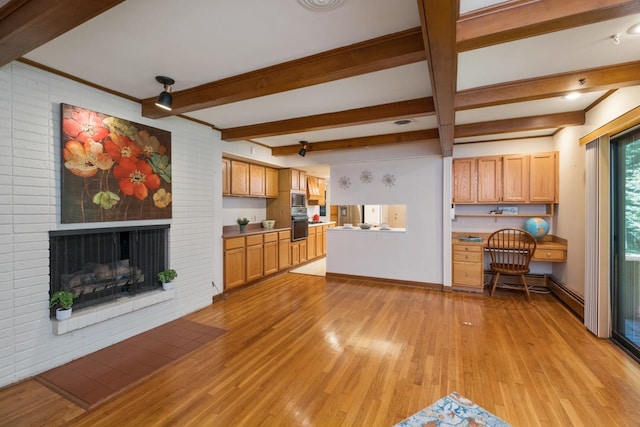 616 Lynn Ln, Waynesboro, VA 22980 - unfurnished living room featuring light wood-style flooring, beam ceiling, and a fireplace