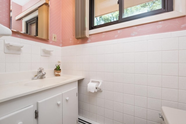 616 Lynn Ln, Waynesboro, VA 22980 - bathroom featuring wallpapered walls, vanity, wainscoting, and tile walls