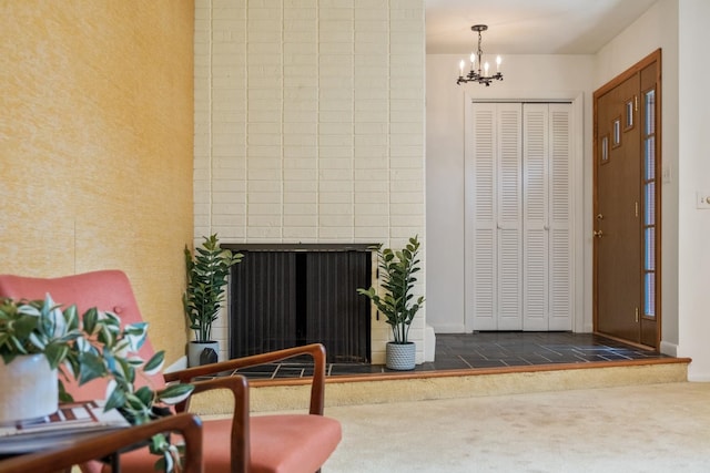 616 Lynn Ln, Waynesboro, VA 22980 - carpeted foyer with a chandelier and a fireplace