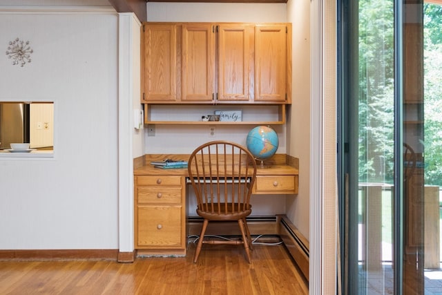 616 Lynn Ln, Waynesboro, VA 22980 - office space with light wood-style floors, baseboard heating, and built in study area