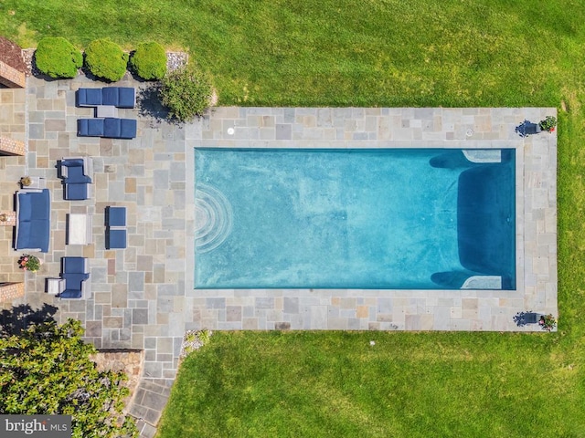  - drone / aerial view of a pool area