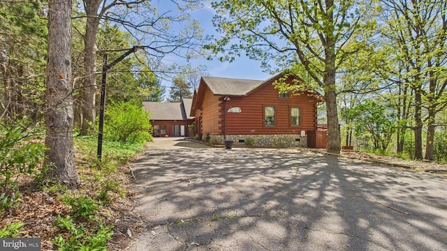 974 Cross Mountain Rd, Luray, VA 22835 - view of side of home with crawl space, roof with shingles, aphalt driveway, and log siding