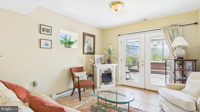 974 Cross Mountain Rd, Luray, VA 22835 - living room with a baseboard heating unit, a wealth of natural light, french doors, and visible vents