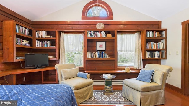 974 Cross Mountain Rd, Luray, VA 22835 - living area with vaulted ceiling, built in study area, a wealth of natural light, and wood finished floors