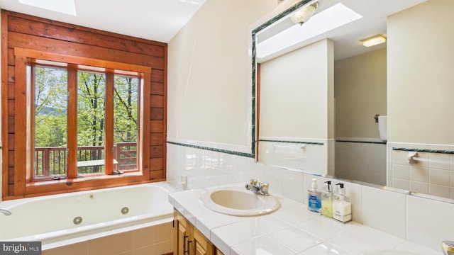 974 Cross Mountain Rd, Luray, VA 22835 - full bath with double vanity, a whirlpool tub, a skylight, and a sink