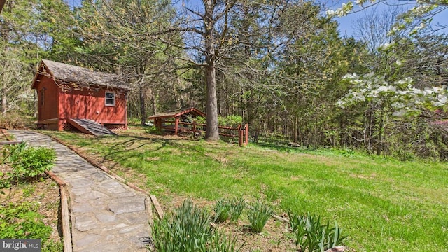 974 Cross Mountain Rd, Luray, VA 22835 - view of yard with a storage unit and an outdoor structure