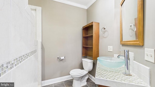 974 Cross Mountain Rd, Luray, VA 22835 - full bath with toilet, baseboards, ornamental molding, a sink, and tile patterned floors