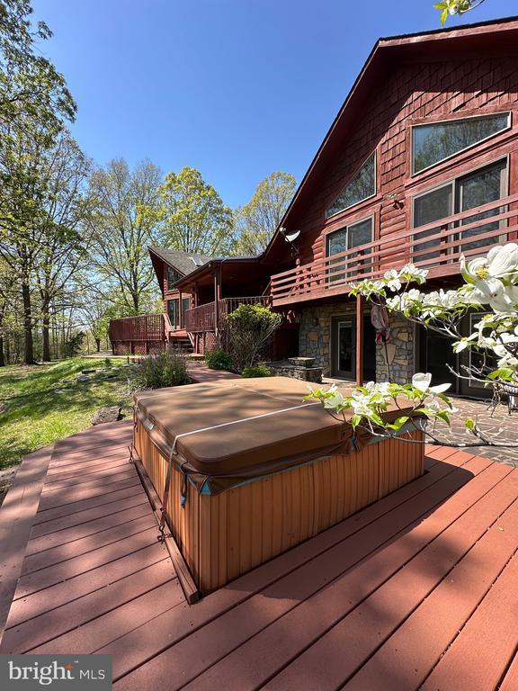 974 Cross Mountain Rd, Luray, VA 22835 - wooden terrace featuring a covered hot tub