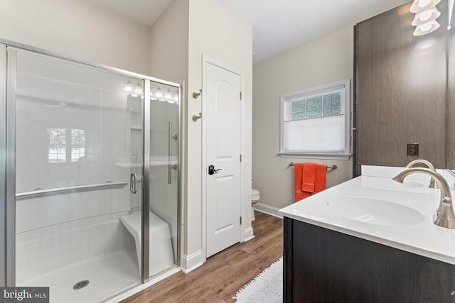 1315 Eastover Pkwy, Locust Grove, VA 22508 - full bathroom with a stall shower, wood finished floors, and double vanity