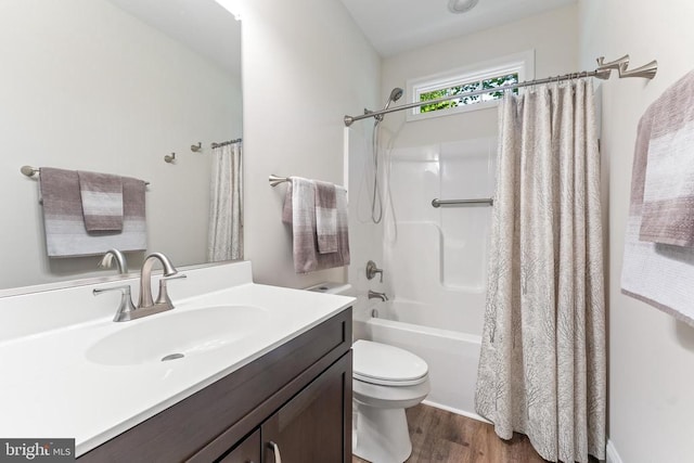 1315 Eastover Pkwy, Locust Grove, VA 22508 - bathroom featuring wood finished floors, vanity, and shower / tub combo with curtain