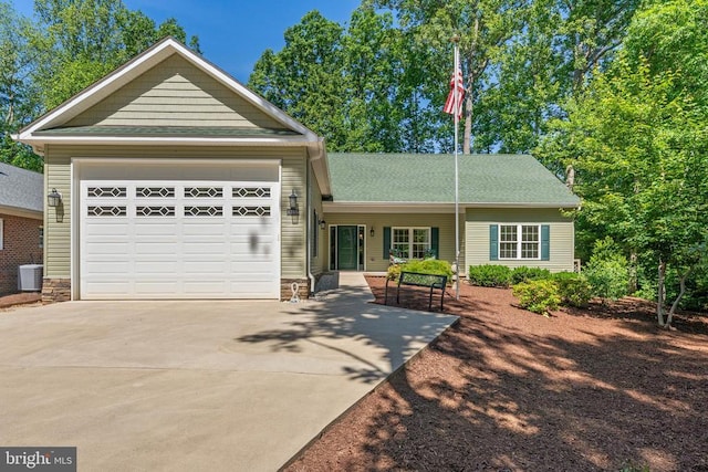 1315 Eastover Pkwy, Locust Grove, VA 22508 - view of front of property with concrete driveway and an attached garage