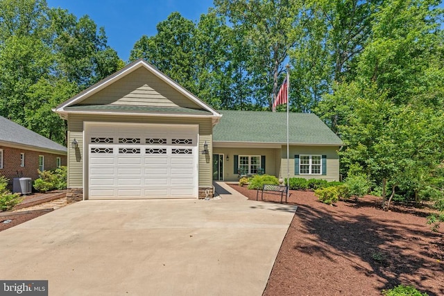 1315 Eastover Pkwy, Locust Grove, VA 22508 - view of front of house featuring a garage and concrete driveway