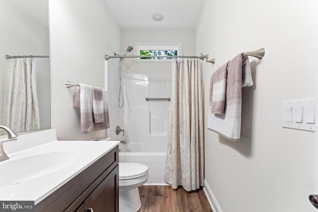 1315 Eastover Pkwy, Locust Grove, VA 22508 - full bathroom with vanity, wood finished floors, and shower / bath combination with curtain