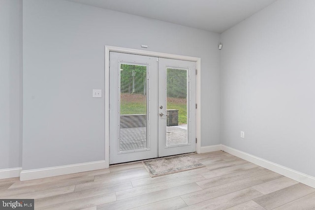 7308 Glenhaven Dr, Fredericksburg, VA 22407 - doorway with french doors and wood finished floors