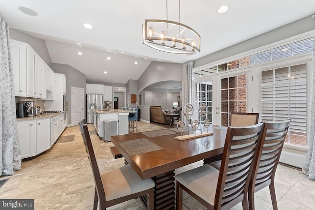 7308 Glenhaven Dr, Fredericksburg, VA 22407 - dining area featuring a chandelier, recessed lighting, lofted ceiling, and arched walkways