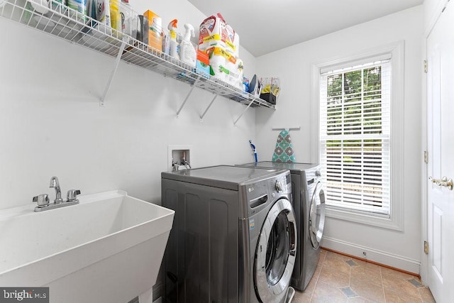 7308 Glenhaven Dr, Fredericksburg, VA 22407 - laundry room featuring separate washer and dryer and light tile patterned flooring