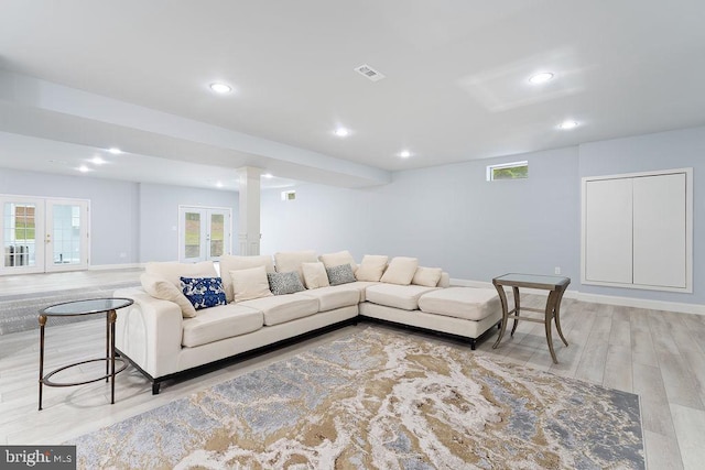 7308 Glenhaven Dr, Fredericksburg, VA 22407 - living area with french doors, light wood-style flooring, and recessed lighting