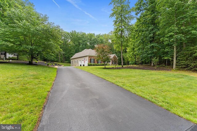 7308 Glenhaven Dr, Fredericksburg, VA 22407 - view of front of home featuring a front yard and a garage