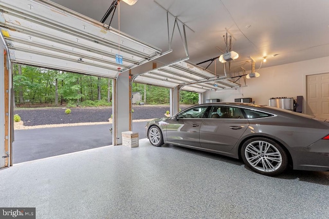 7308 Glenhaven Dr, Fredericksburg, VA 22407 - garage with a garage door opener