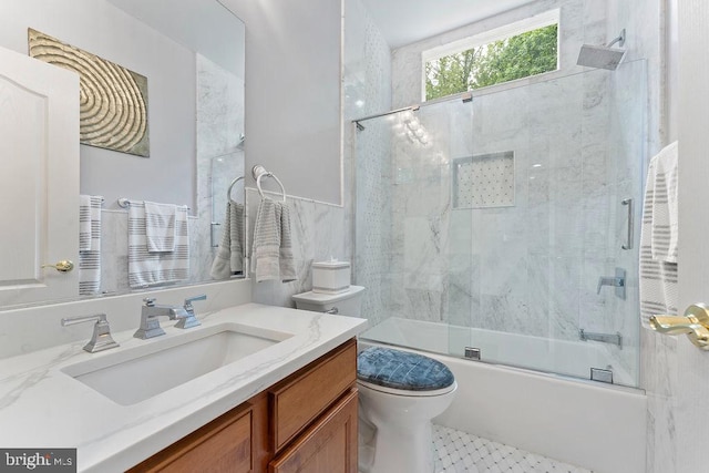 7308 Glenhaven Dr, Fredericksburg, VA 22407 - bathroom featuring vanity and bath / shower combo with glass door